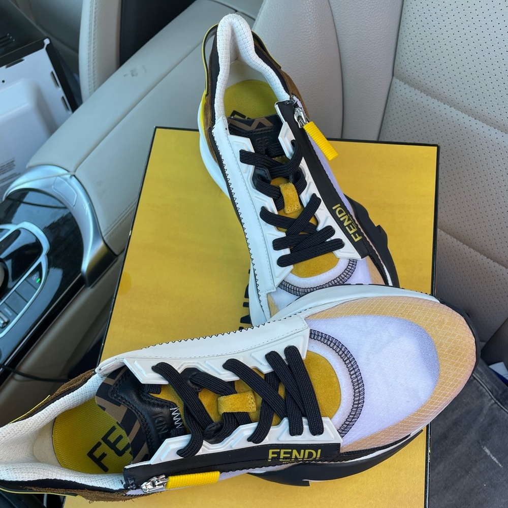 WORN NO MORE THAT ONCE. Just like new. Brought directly from the fendi store.